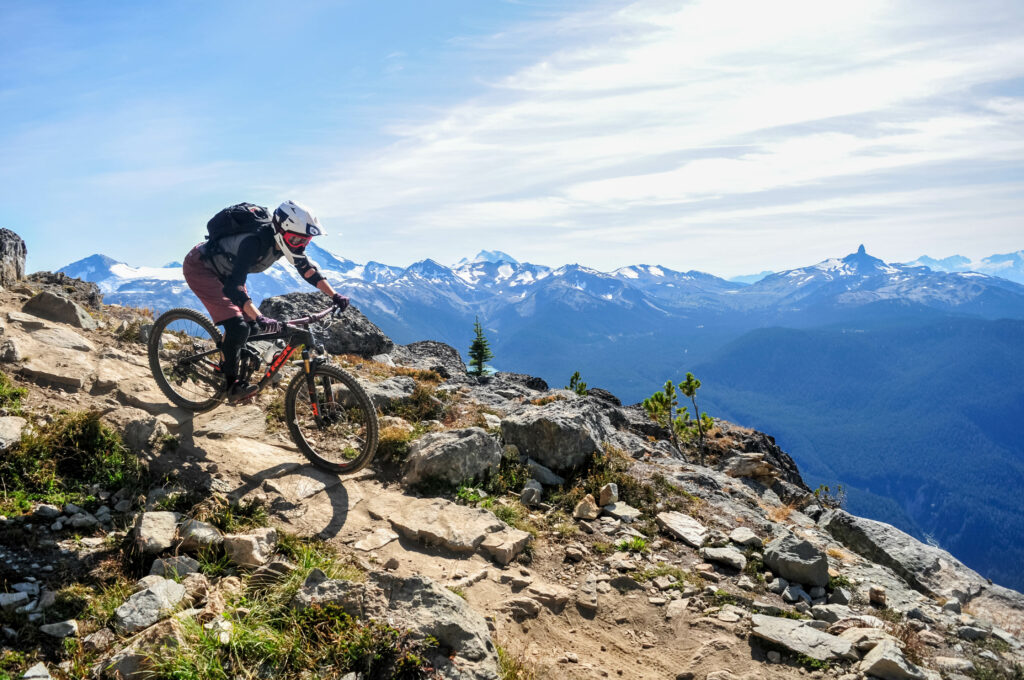 mountain biking over beautiful terrain.